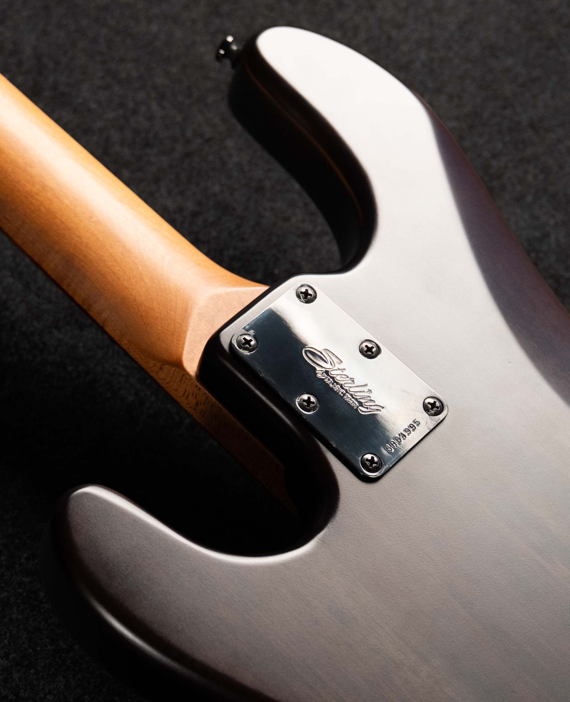 Бас-гитара Sterling StingRay RAY34-PB, Poplar Burl Top, Trans Black - купить в "Гитарном Клубе"