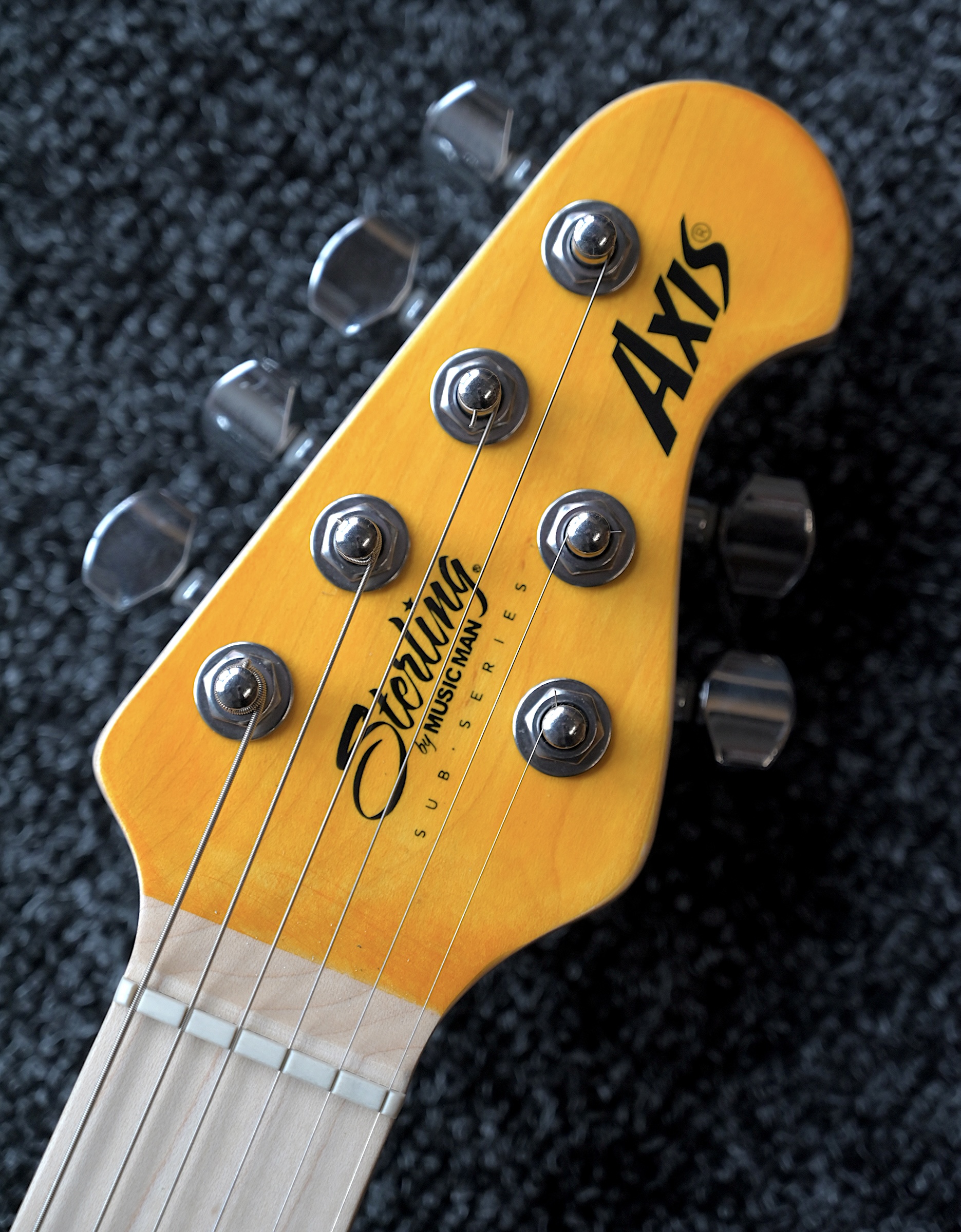 Электрогитара Sterling Axis Trans Gold - купить в "Гитарном Клубе"