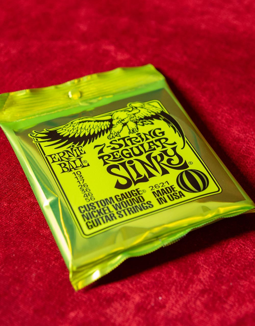 Струны для 7-струнной электрогитары Ernie Ball 2621 Regular Slinky, 10-56 - купить в "Гитарном Клубе"