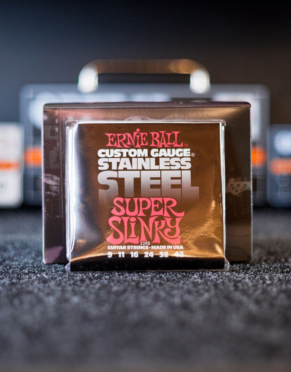 Струны для электрогитары Ernie Ball 2248 Super Slinky, 9-42 - купить в "Гитарном Клубе"